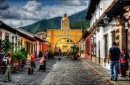Rua do Cobblestone em Antigua, Guatemala