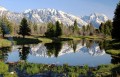 Grand Tetons Refletido em uma Lagoa