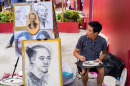 Artista de Rua em Hochiminh, Vietnã
