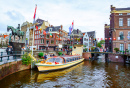 Canais de Amsterdã com Barcos