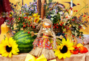 Foto de Decoração de Outono e uma Boneca Nacional Artesanal com Folhas, Melancias, Flores e Colheita