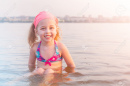 197693408-a-child-in-a-swimsuit-in-the-water-in-the-summer-a-little-girl-is-bathing-in-the-river-in-the-city