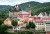 Medieval Castle Loket At the Top of the Rocky Hill With Trees By Summer Day
karlovarsky Region, Czech Republic– June 06, 2020