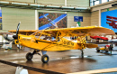 Yellow Piper J3 Cub em Friedrichshafen, Alemanha
