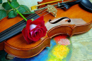 Composição com violino e rosa vermelha