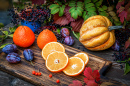 Natureza-morta de outono de frutas e uma abóbora
